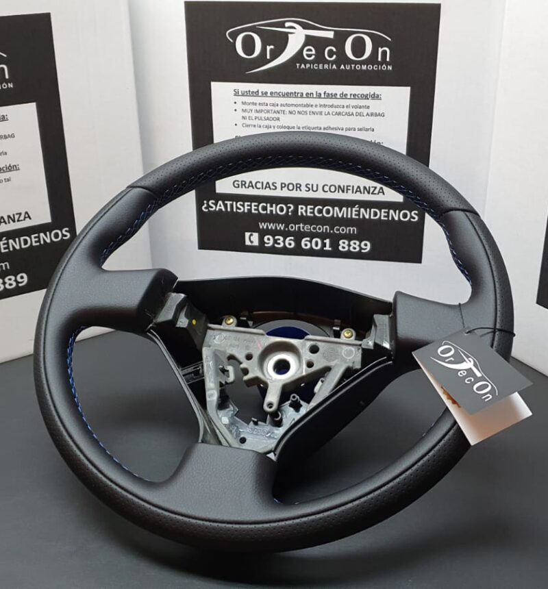 Tapizado volante CHEVROLET CRUZE LS 2014 en Exclusiva piel natural Napa lisa automoción con punzonado y pespunte hilo a color by ORTECON®
